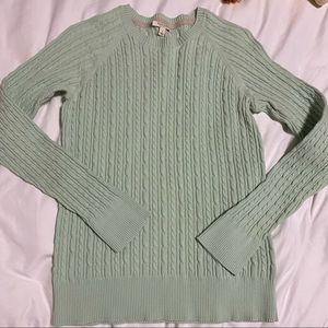 green cable knit sweater